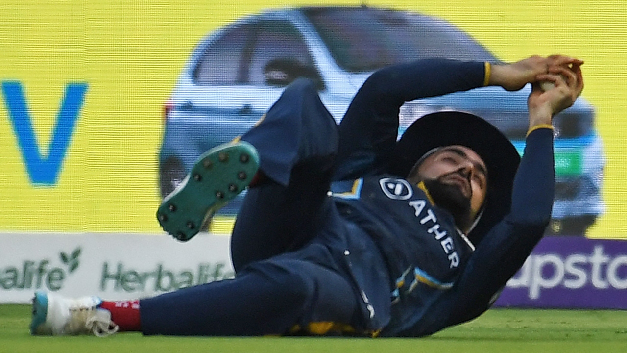 Rashid Khan took home the 'Catch of the Season' trophy at the conclusion of the Indian Premier League (IPL) 2023. Credit: AFP Photo