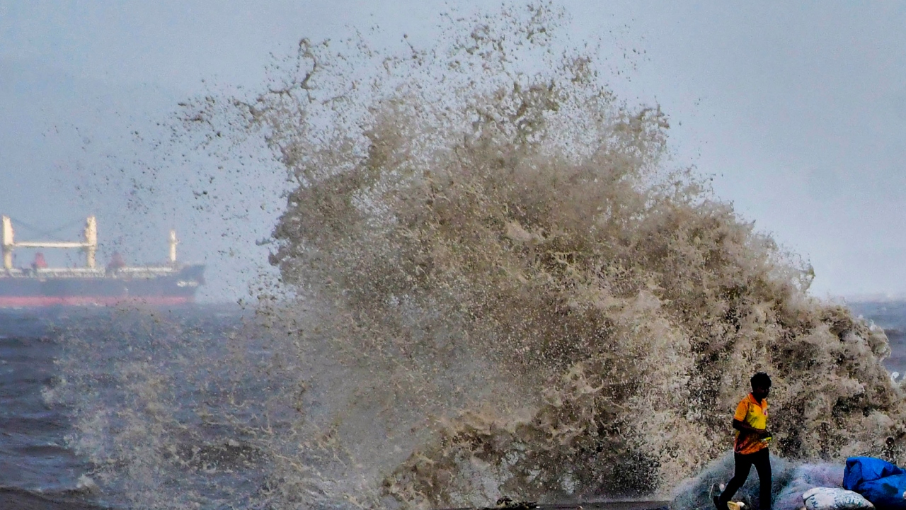 Strong winds and high tides were witnessed at Marine Drive in Mumbai as Cyclone ‘Biparjoy’ intensified into a 'very severe' cyclonic storm. Credit: PTI Photo