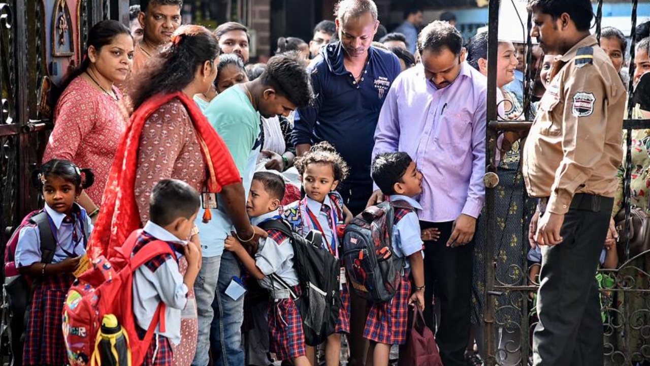 Students arrive to attend classes at St. Marys Multipurpose School which reopened after summer vacation, in Navi Mumbai, Thursday, June 15, 2023. Credit: PTI Photo