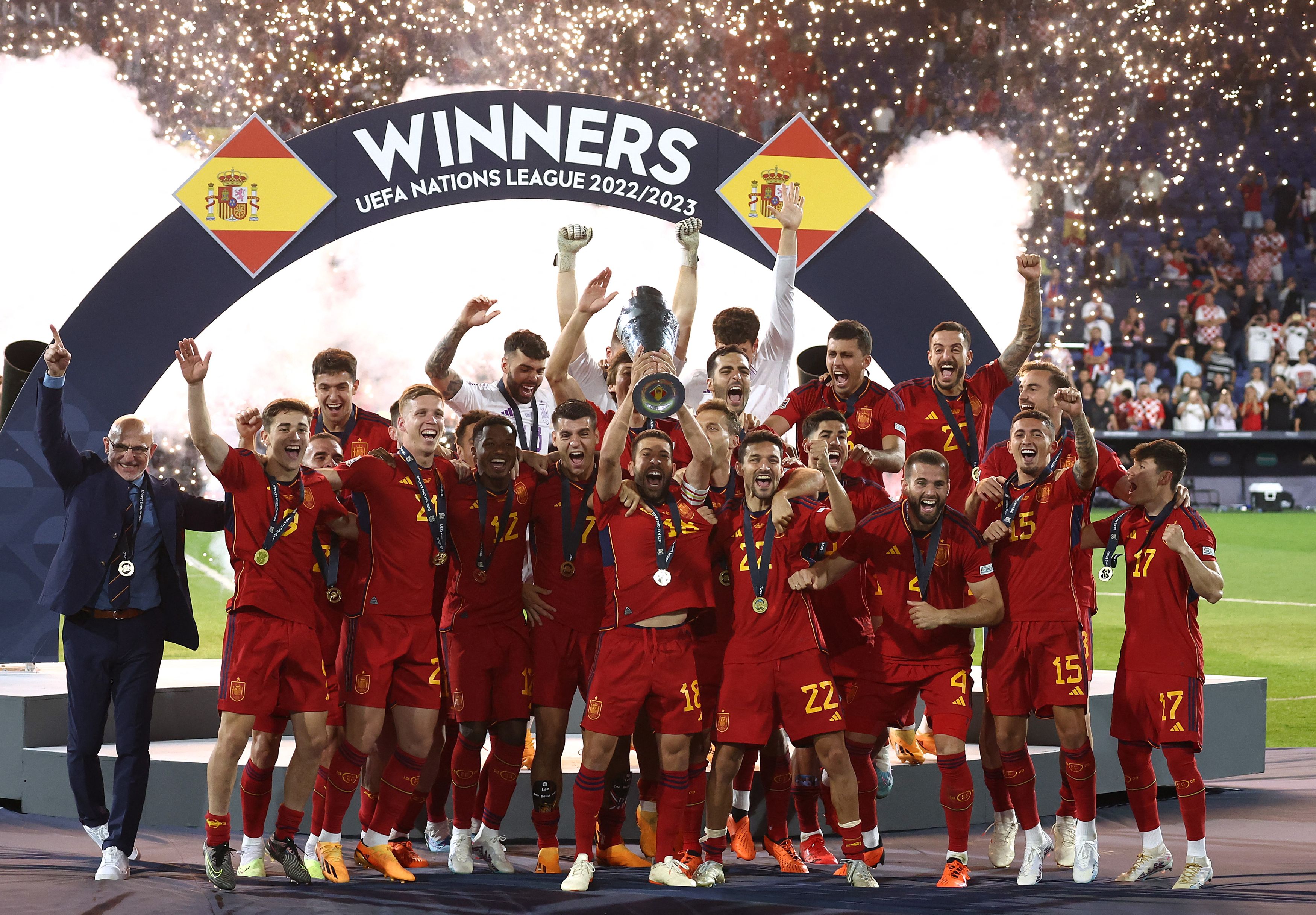 Spain's Jordi Alba lifts the trophy with teammates after winning the UEFA Nations League final. Credit: Reuters Photo