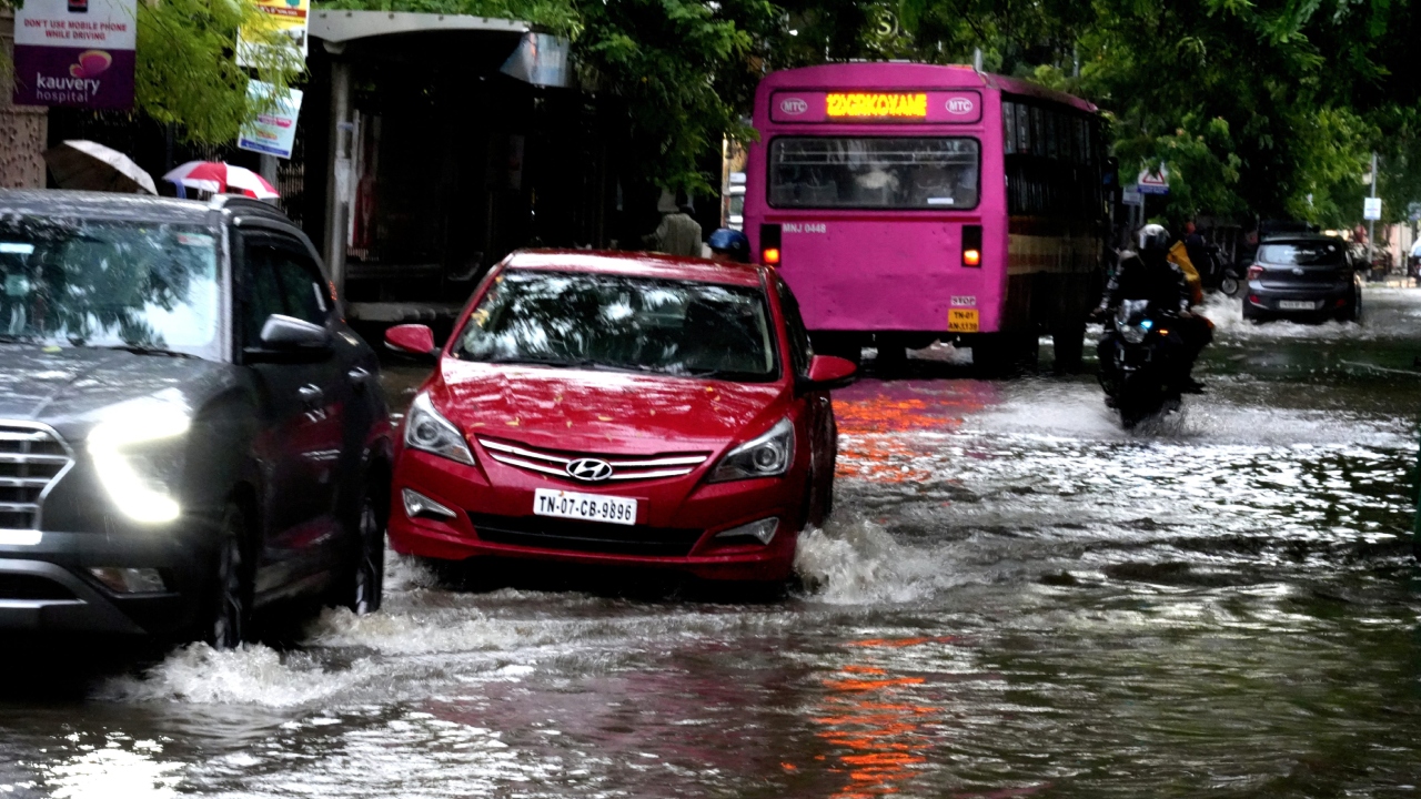 Vehicles drove through several waterlogged roads, including the Rajiv Gandhi IT Expressway, after the rainfall in Chennai. Credit: PTI Photo
