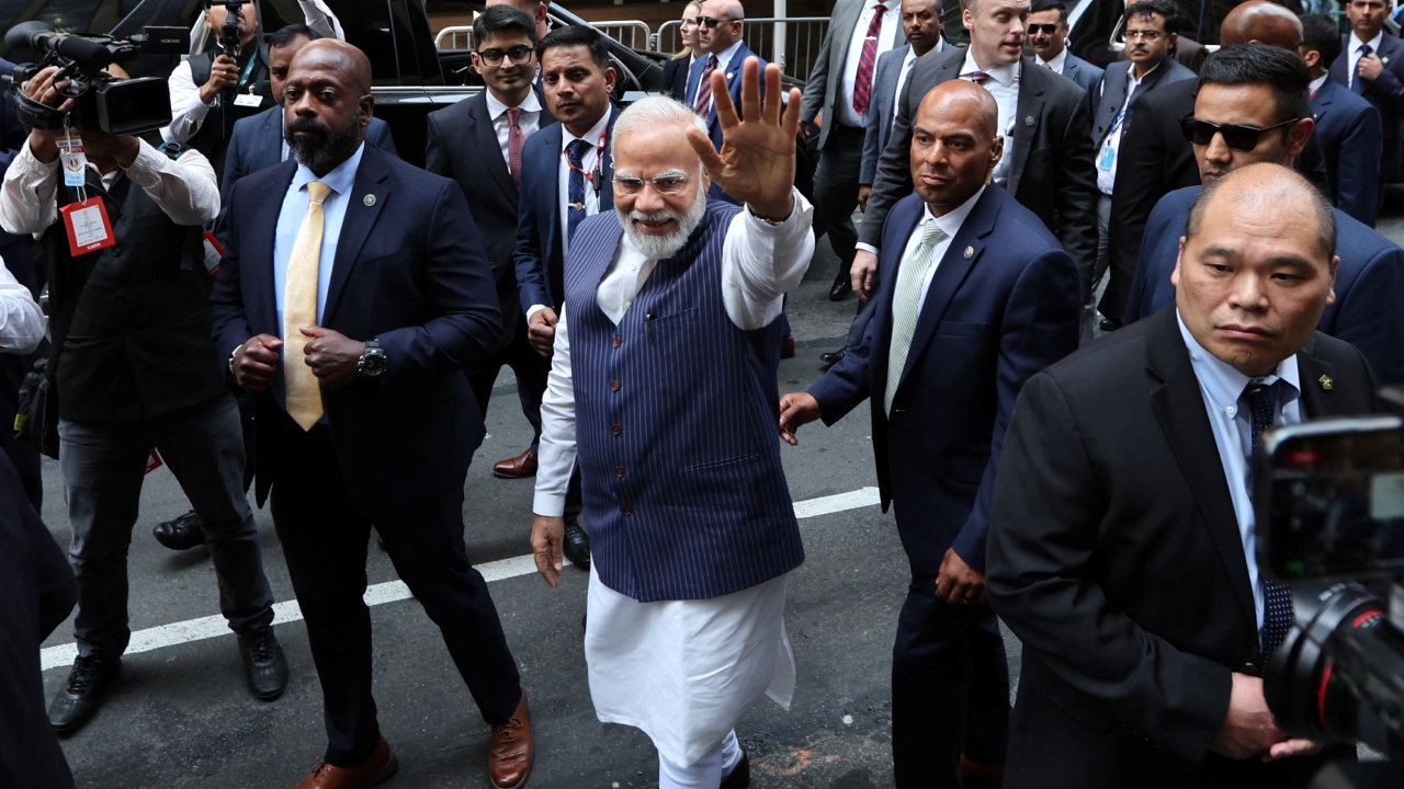 PM Modi also came out of the hotel to greet the chanting crowd. Credit: Reuters Photo