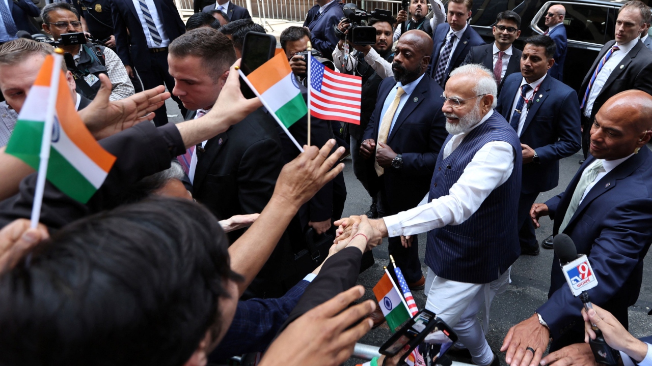 Indian-American community members cheers for PM Modi and raise slogans in his favour. Credit: Reuters Photo