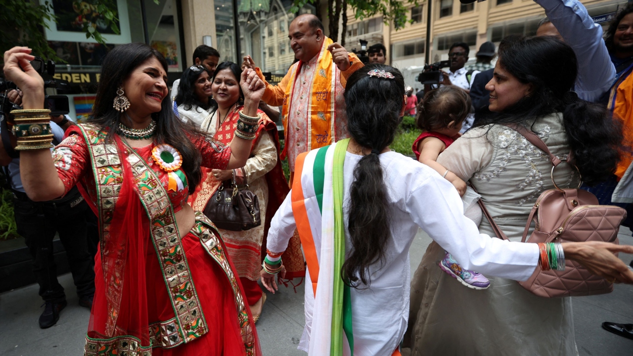Modi's arrival witnessed a delirious welcome by his flag-waving supporters chanting his name at the JFK Airport and dancing in front of his hotel. Credit: Reuters Photo