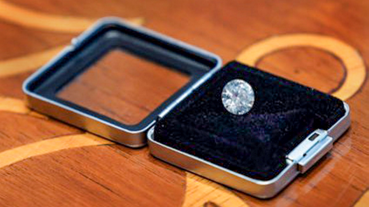 Modi also gifted a 7.5-carat lab-grown diamond to First Lady Jill, which reflects earth-mined diamonds’ chemical and optical properties, along with a papier mache box, known as kar-e-kalamdani, in which the green diamond is placed. Credit: PTI Photo
