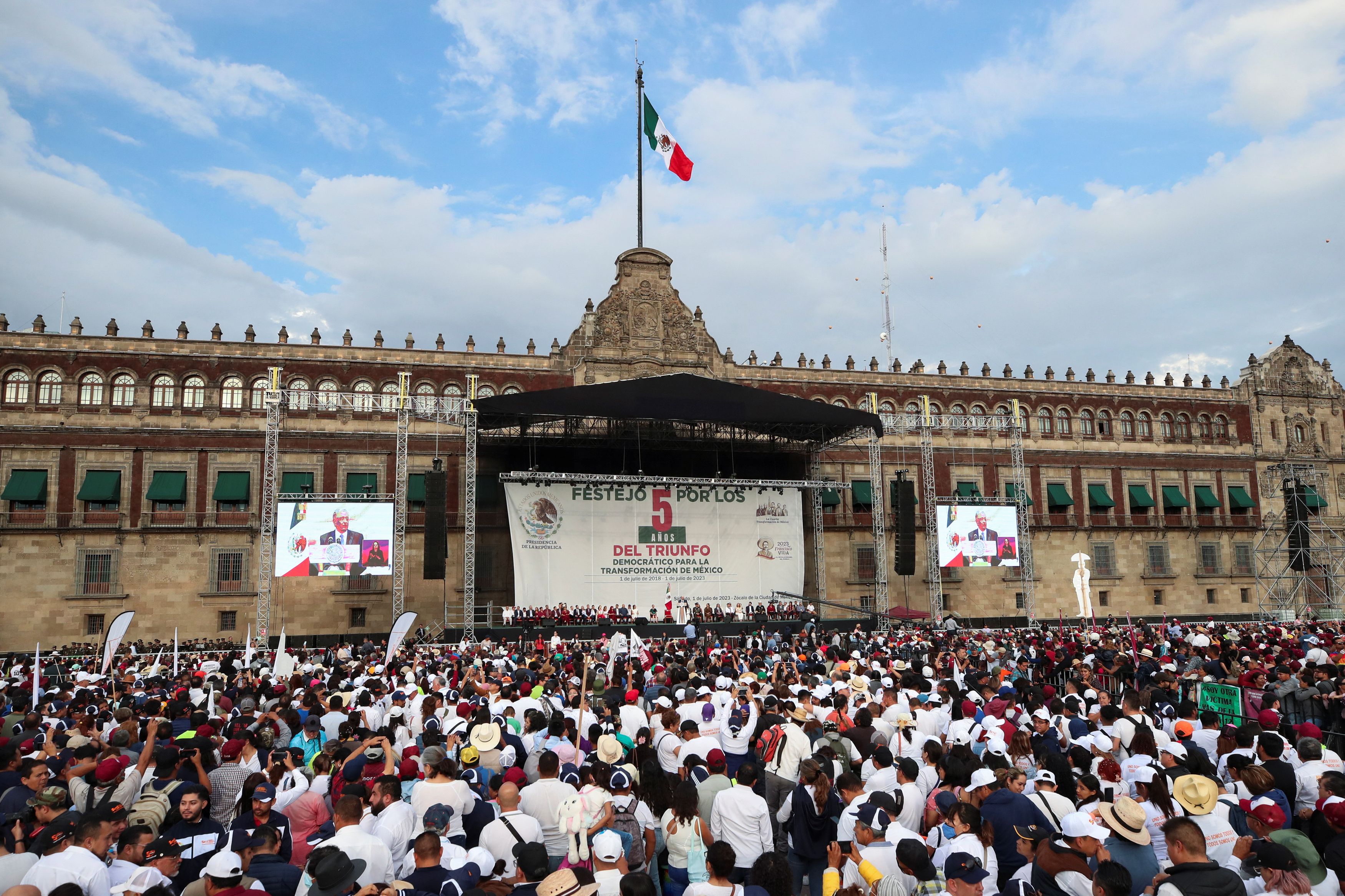 Supporters of Mexico's President Andres Manuel Lopez Obrador gather at the Zocalo square for an event to mark the fifth anniversary of Lopez Obrador election victory on July 1, 2018, in Mexico City. Credit: Reuters Photo