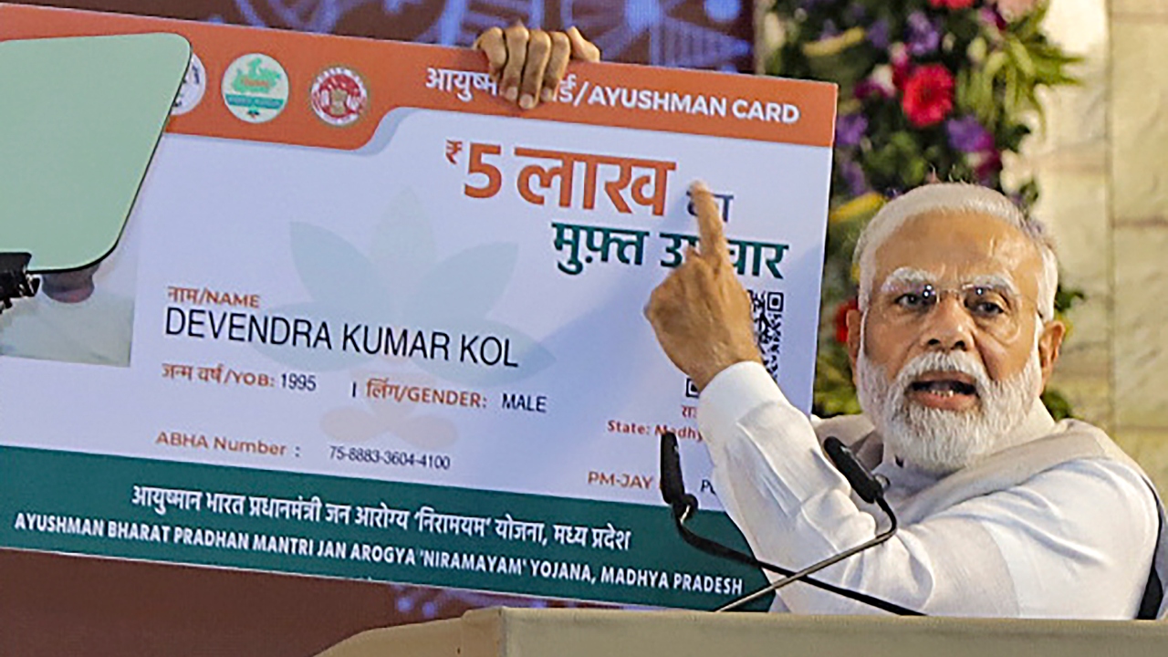 He also started the distribution of over 3 crore digital Ayushman cards in the country and 1 crore PVC Ayushman Bharat cards in MP. Credit: PTI Photo