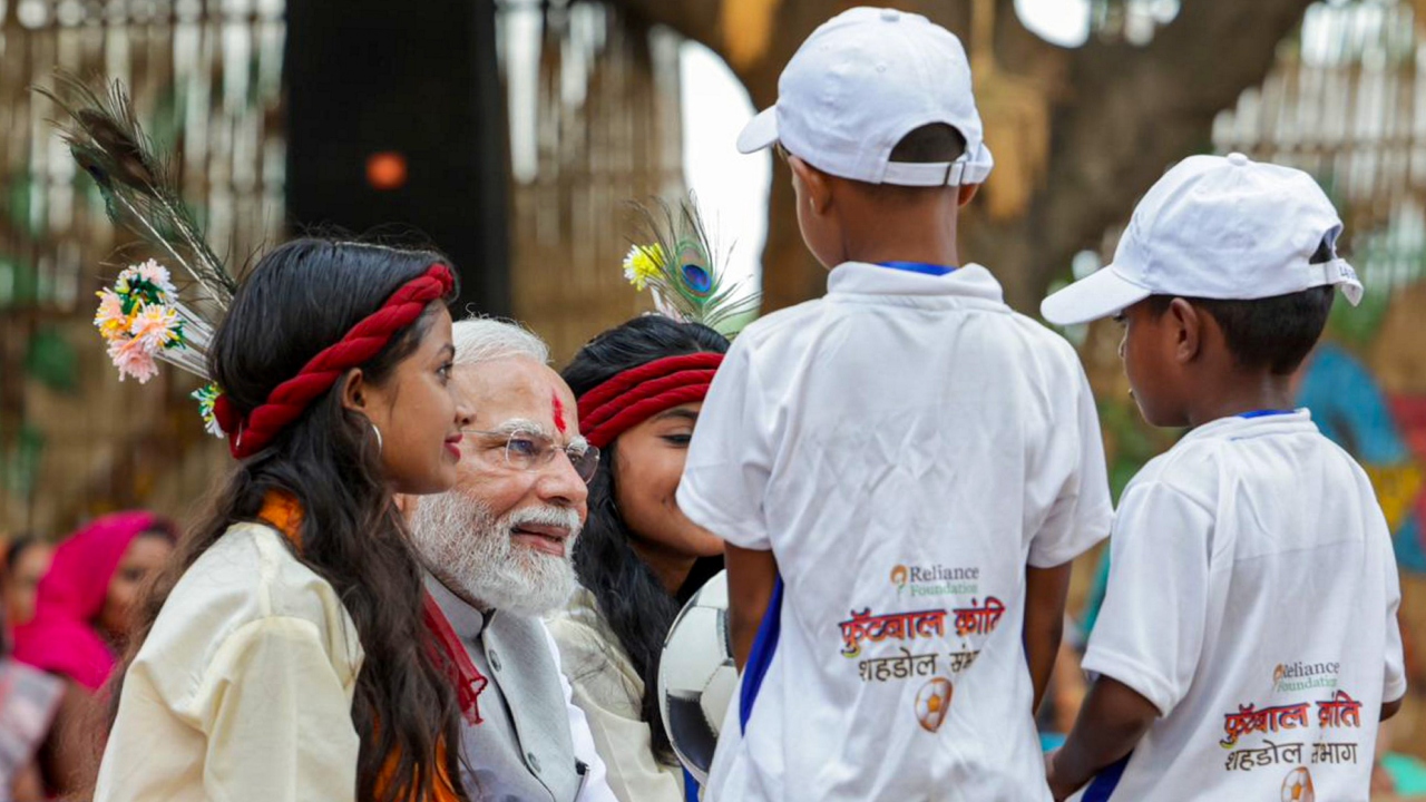 The PM met PESA committee members, Lakhpati didis from SHGs (Self-Help Groups) and young football players. Credit: PTI Photo