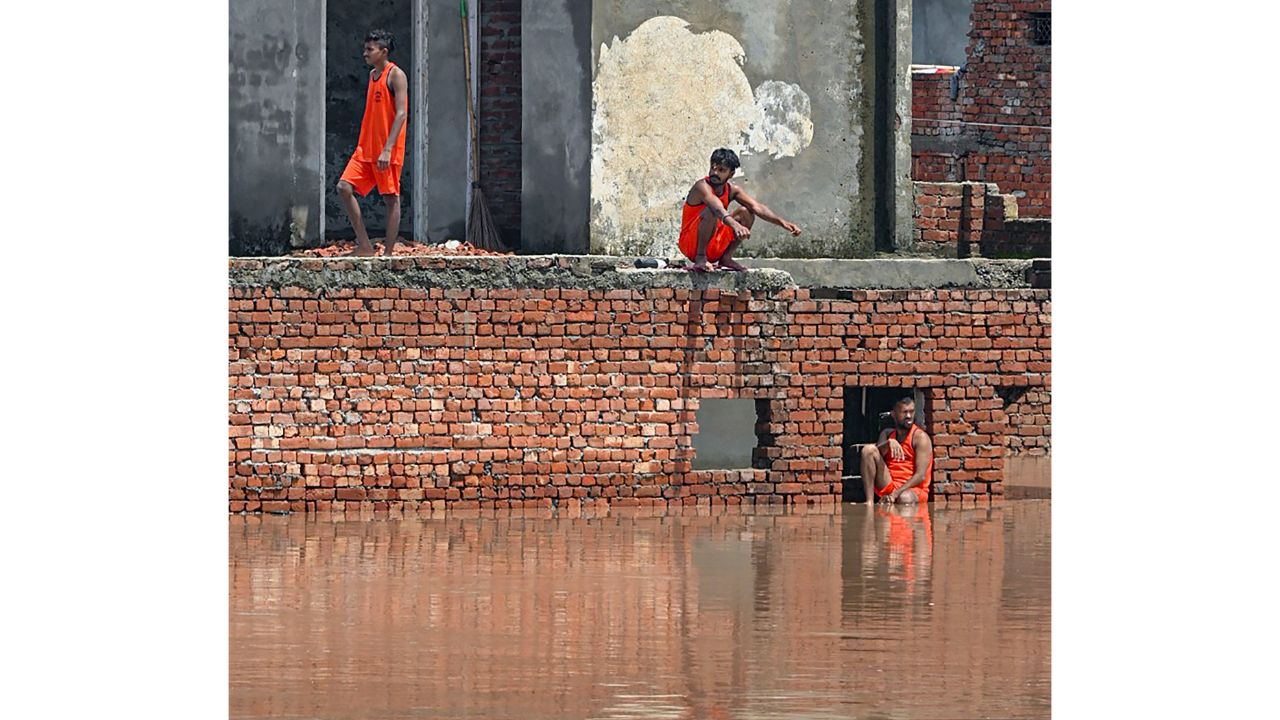 Floodwaters of the swollen Badi Nadi river inundates a locality in Patiala. Credit: PTI Photo