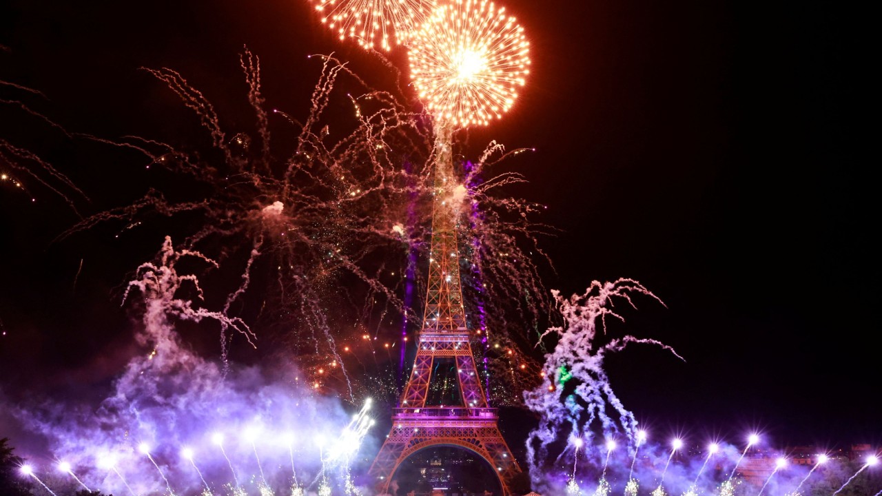 Fireworks explode around the Eiffel Tower during celebrations to mark Bastille Day, in Paris. Credit: Reuters Photo