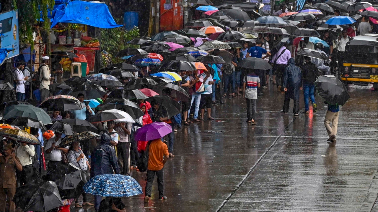 The heavy downpour on Wednesday (July 19) caused water-logging in many low-lying areas and affected local train services. Credit: PTI Photo