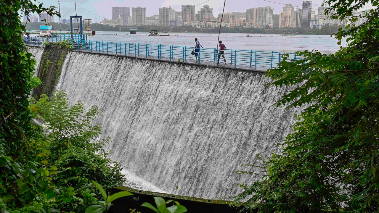 Powai Lake overflows due to heavy monsoon rains in Mumbai. Credit: PTI Photo