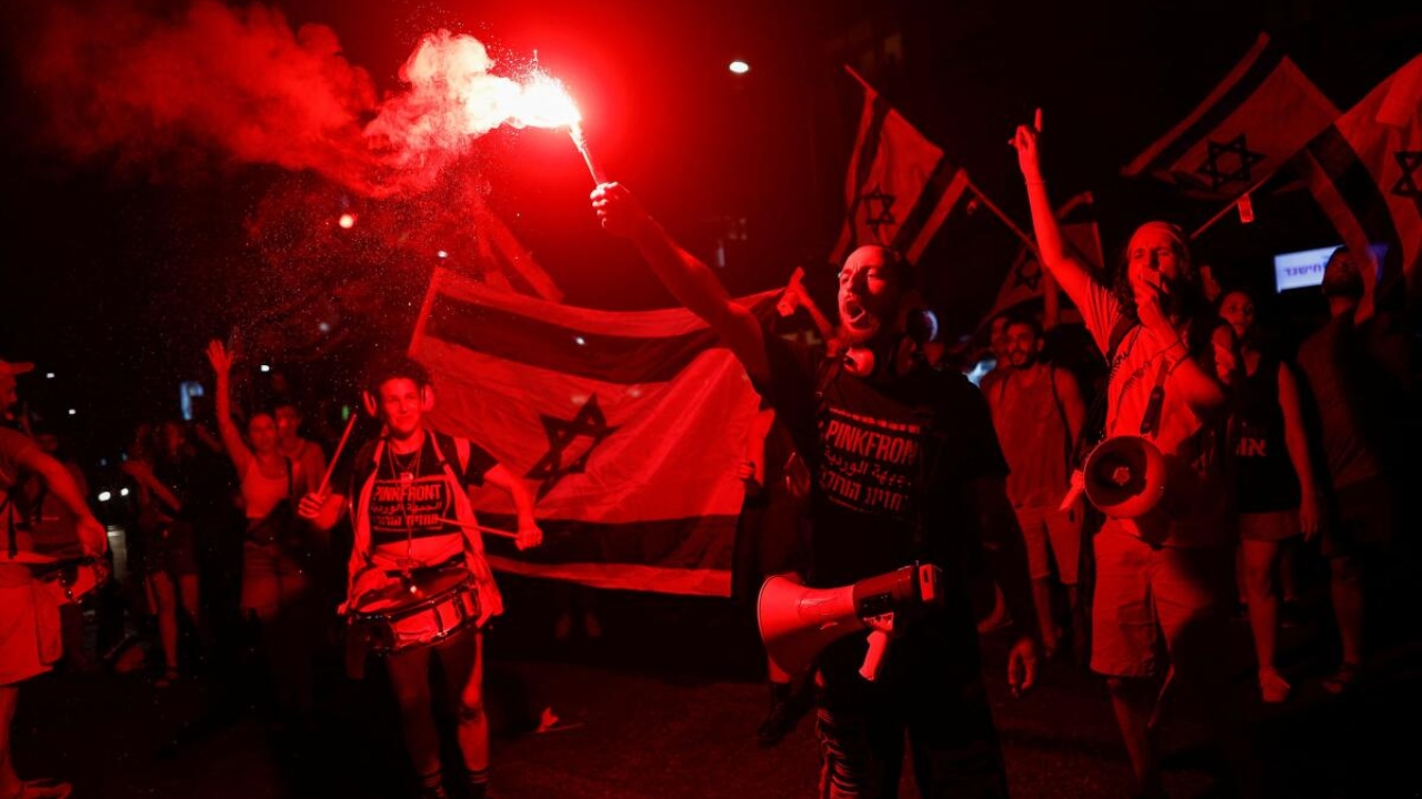 People take part in a demonstration against Israeli Prime Minister Benjamin Netanyahu and his nationalist coalition government's judicial overhaul, in Tel Aviv, Israel, July 22, 2023. Credit: Reuters Photo