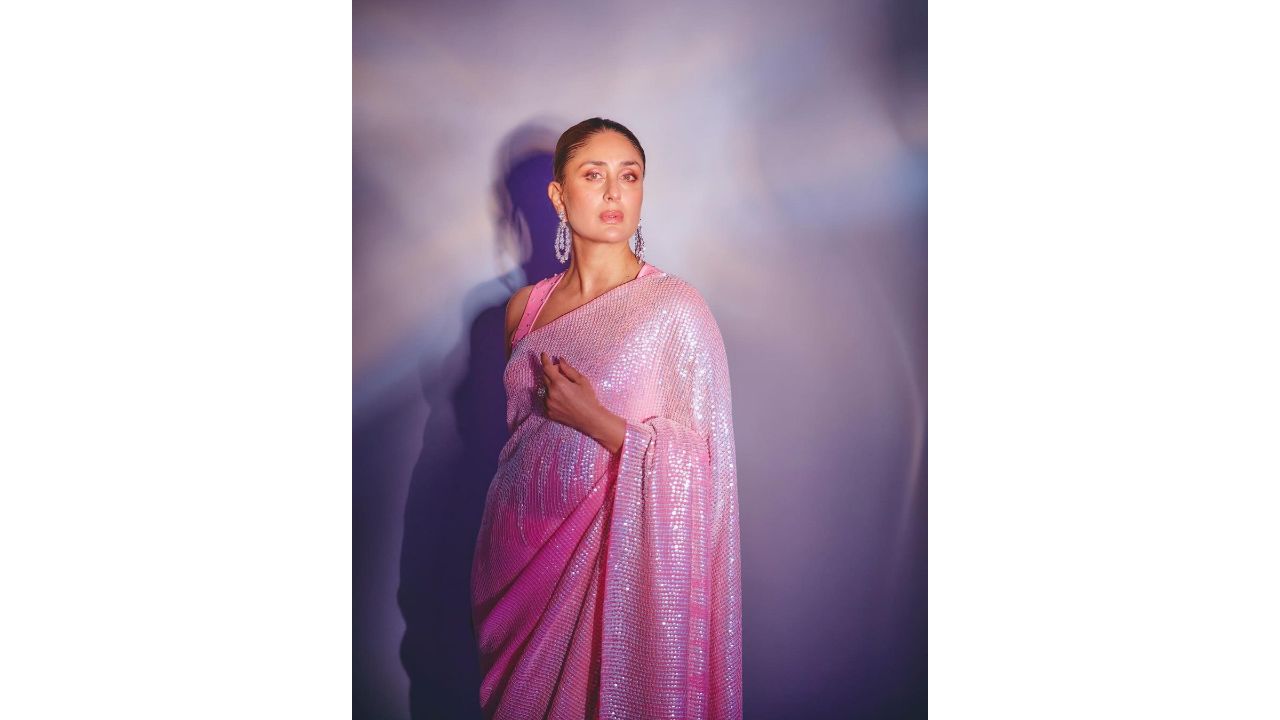 Kareena Kapoor Khan left everyone mesmerised with her exquisite pink saree from renowned designer Manish Malhotra's collection. The delicate drape of the saree was adorned with intricate sequins throughout, adding a touch of shimmer to her ensemble. With her hair neatly bunched up and a captivating look featuring pink on her eyes and light pink lips, Kareena exuded sheer beauty and elegance. Credit: Instagram/@kareenakapoorkhan