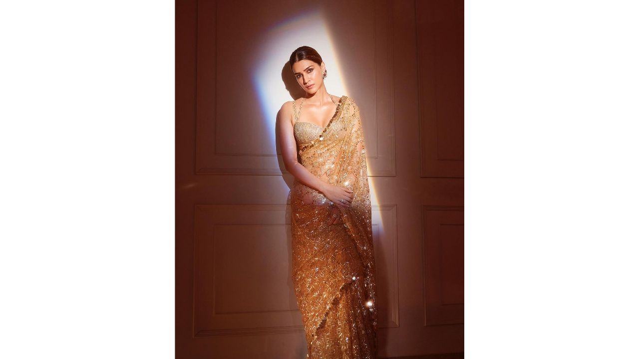 Kriti Sanon embraced the trend with an embellished and transparent golden saree styled by Sukriti Grover. Her saree featured mini and mighty sequins and beads, creating an aesthetic masterpiece. Paired with a halter neck and an extra strapped blouse, Kriti's ensemble exuded glamour and sophistication. Credit: Instagram/@kritisanon