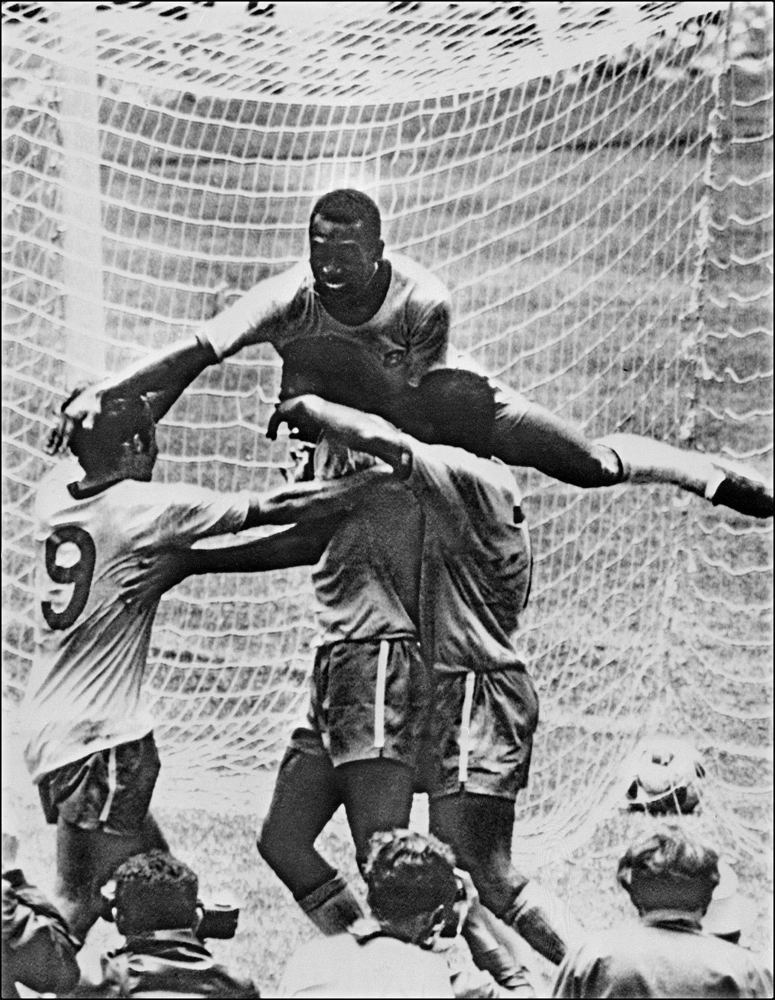 Brazilian forward Pele (top) celebrating with his teammates (from L) Tostao, Carlos Alberto and Jairzinho during the World Cup final between Brazil and Italy, in Mexico City. Credit: AFP Photo