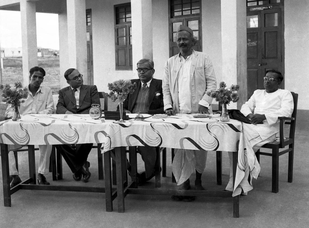 Noted Kannada poet D R Bendre addressing students of Vijaya College Basavanagudi Bangalore_ Prof V K Gokak third from left and G Venkatasubbaiah extreme right on dais