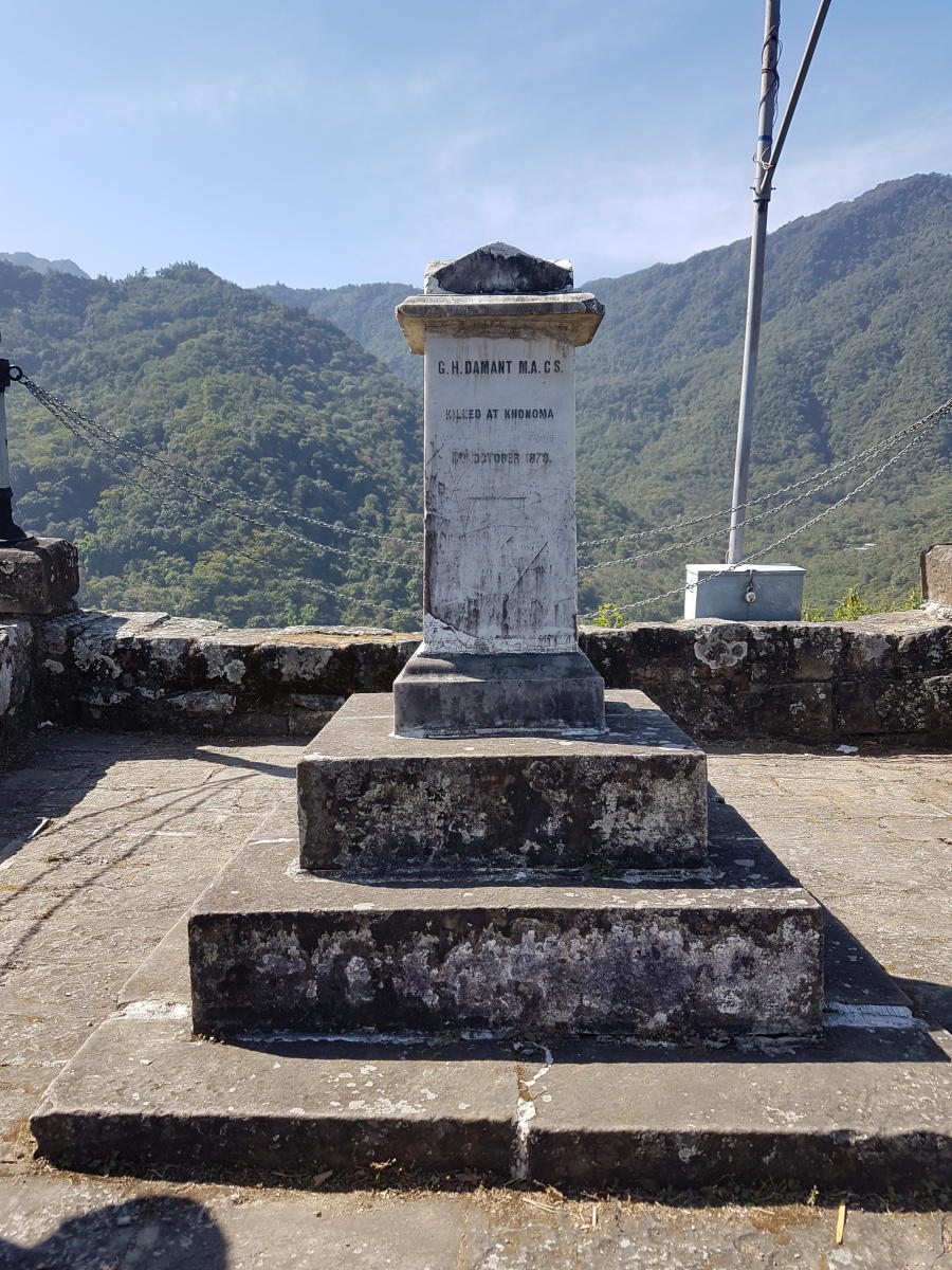 Steep stone steps lead to the peak of the village where the memorial site of British political officer G H Damant, M.A.C.S, who was killed at Khonoma, lies.