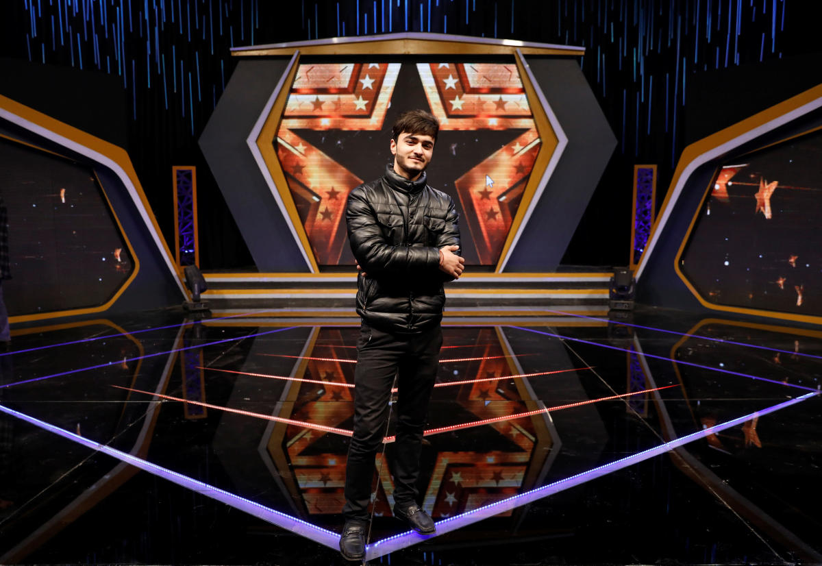 Afghan singer Wasim Anwari, 19, poses for a picture at the Afghan Star talent show at Tolo television studio in Kabul, Afghanistan, January 16, 2019. (REUTERS)