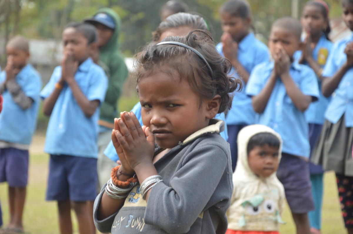 View of a tea estate in Golaghat district, Assam; (top) children of tea garden workers at Halmira garden lower primary school in Golaghat district. photos by Pankaj Protim Bora