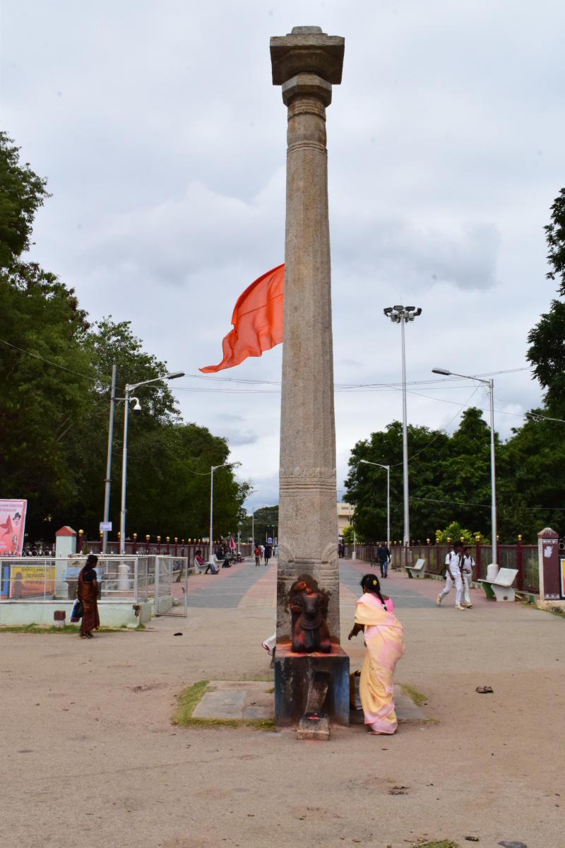 Stone pillar in front of temple. Photos by author