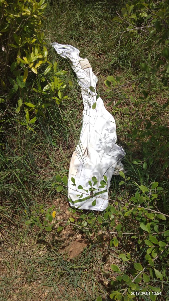 His dhothi was found near a bush.