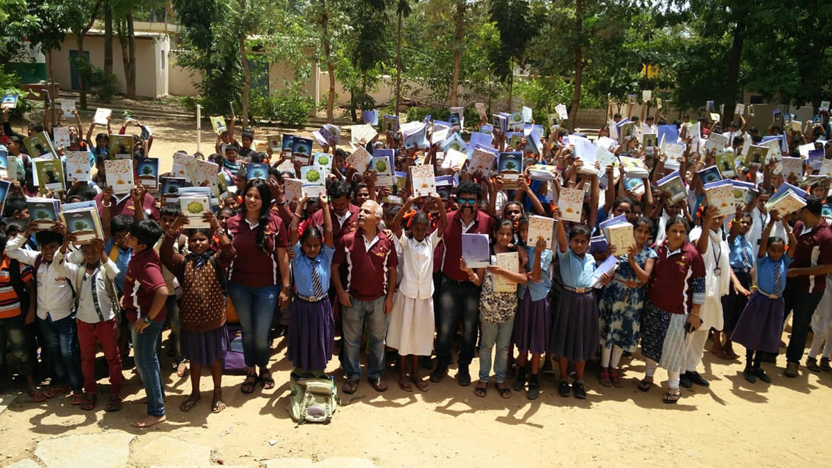 Profit from the Keli Katheya project is used for notebook distribution drives that cover up to 350 Kannada-medium schools across Karnataka; the team of Banavasi Balaga initiates language-centric activities.