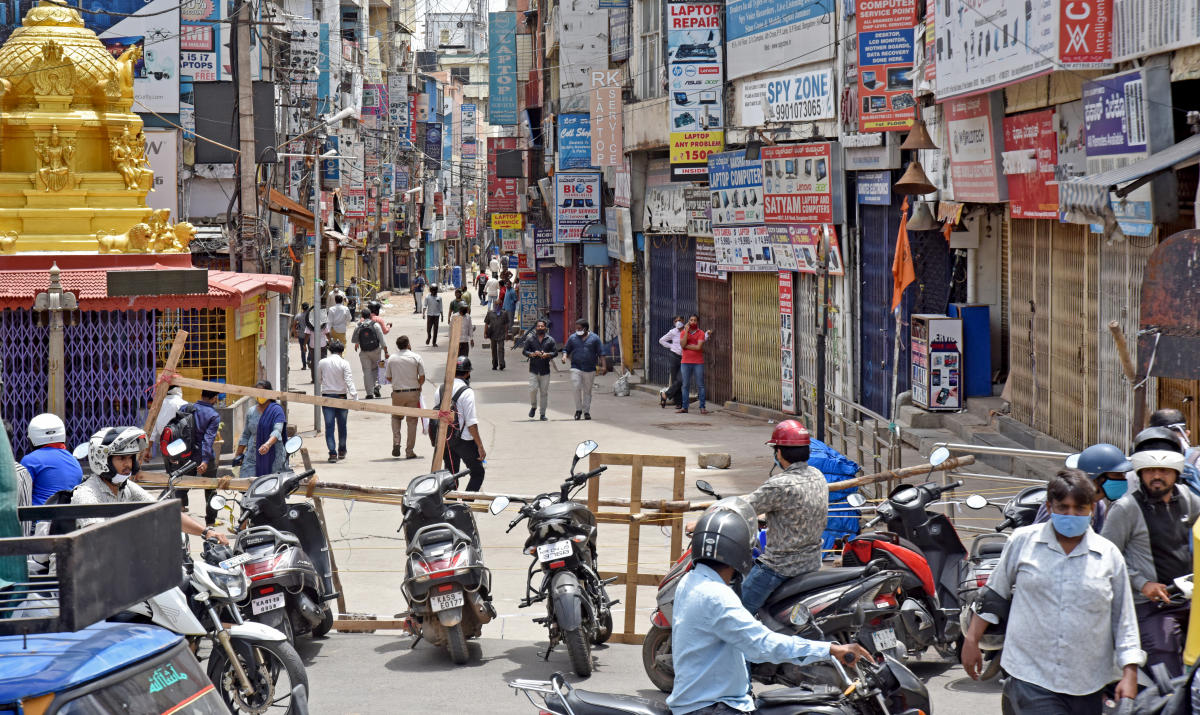 SP Road, the busy electronics hub near KR Market, continued to buzz with people despite being sealed down. DH PHOTO/M S MANJUNATH