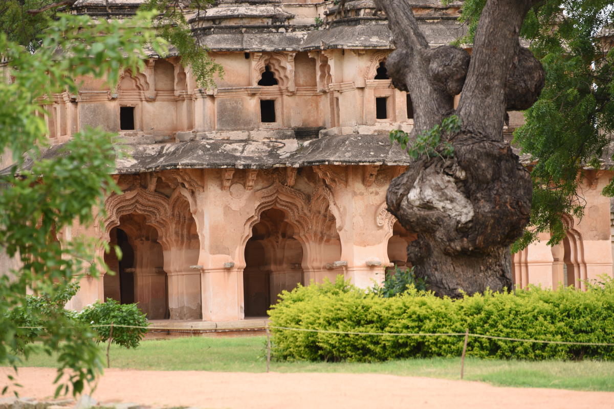 1. Stepwell (Krishna Pushkarini) near the Vijaya Vittala Temple. 2. A view of the Virupaksha Temple. 3. The Lotus Mahal 4. Ritual bathing of an elephant in the Tungabhadra River. Photos by Ramu M & Authors