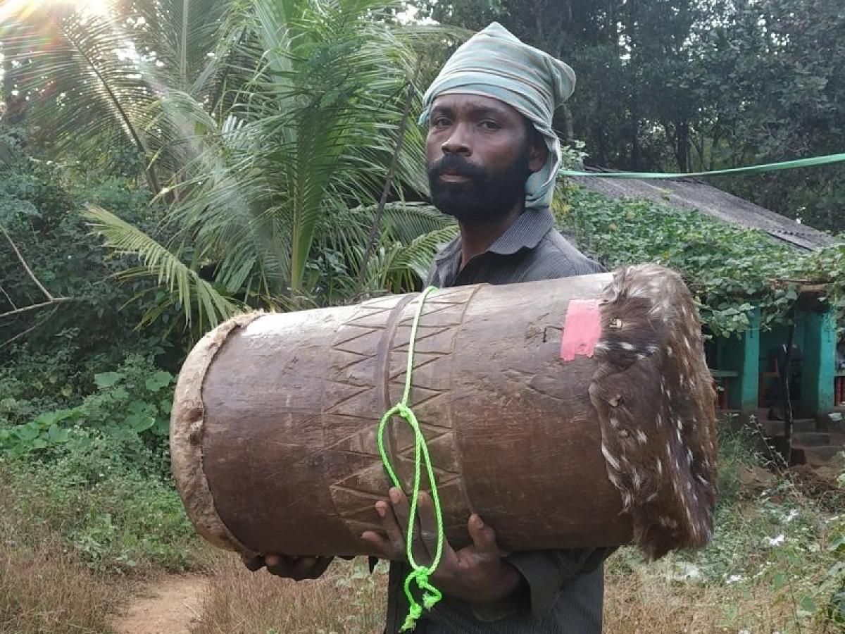 Artist Jackie Siddi with the dholu 