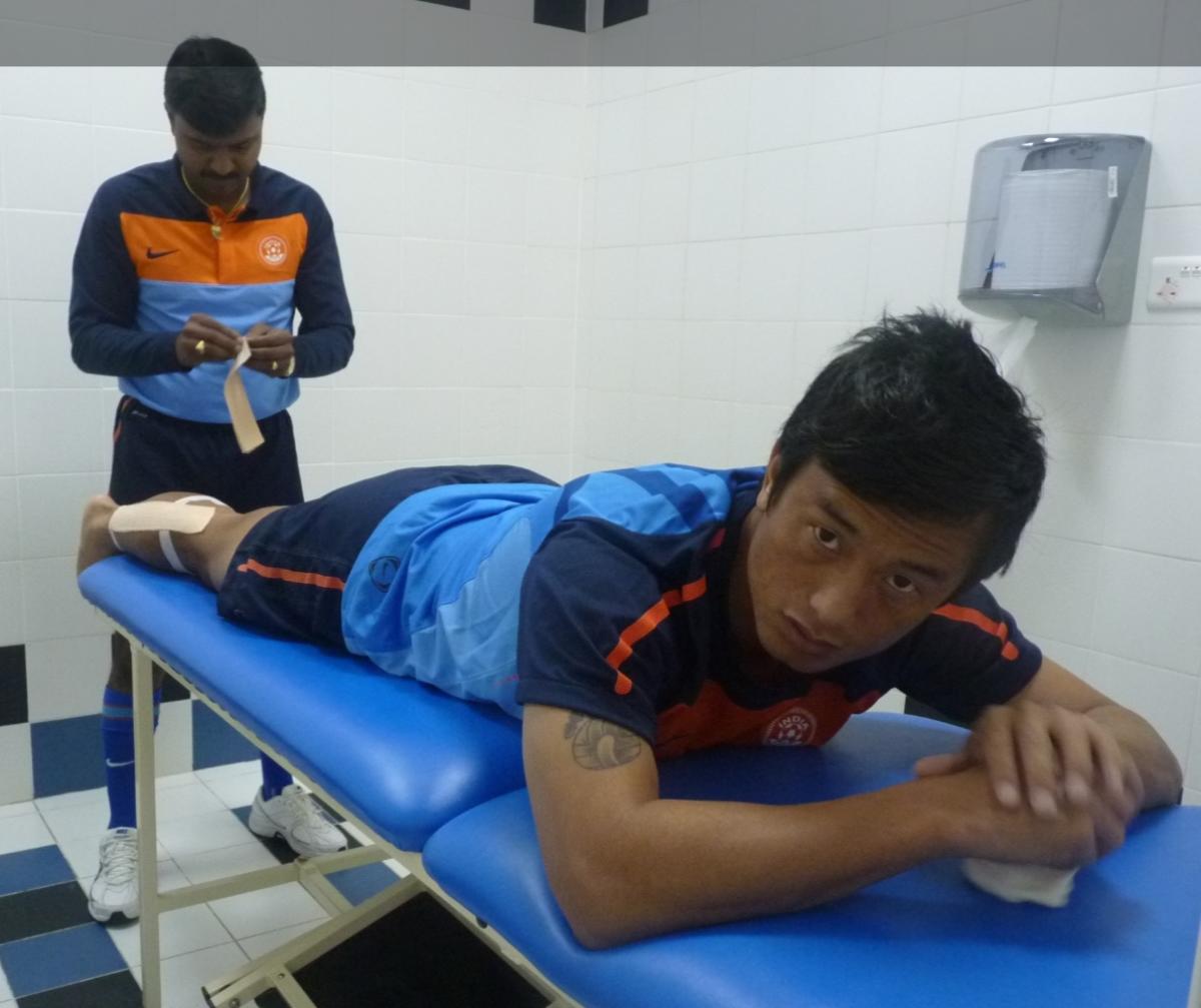 Dr Kiran Kulkarni treating Bhaichung Bhutia 