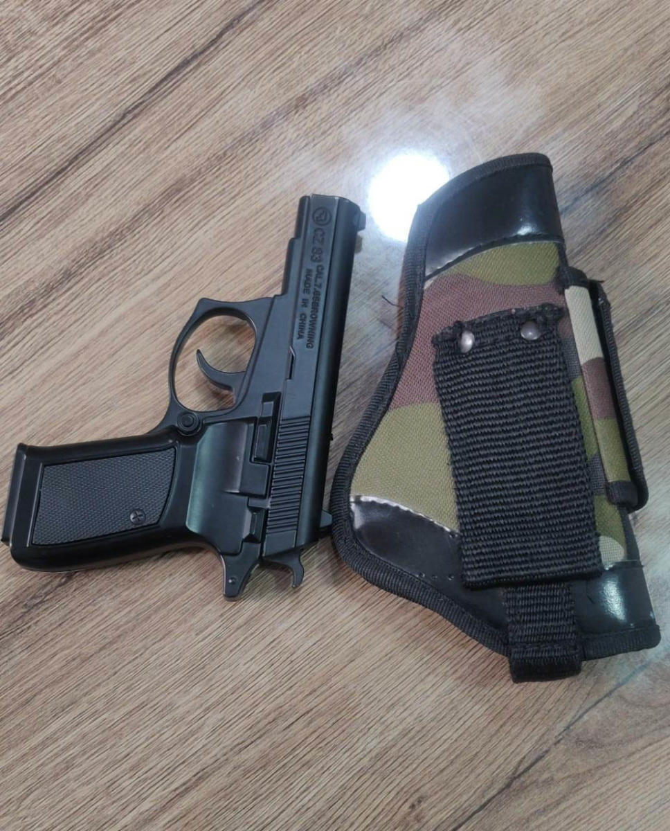 The lighter that he allegedly carried as a gun. 