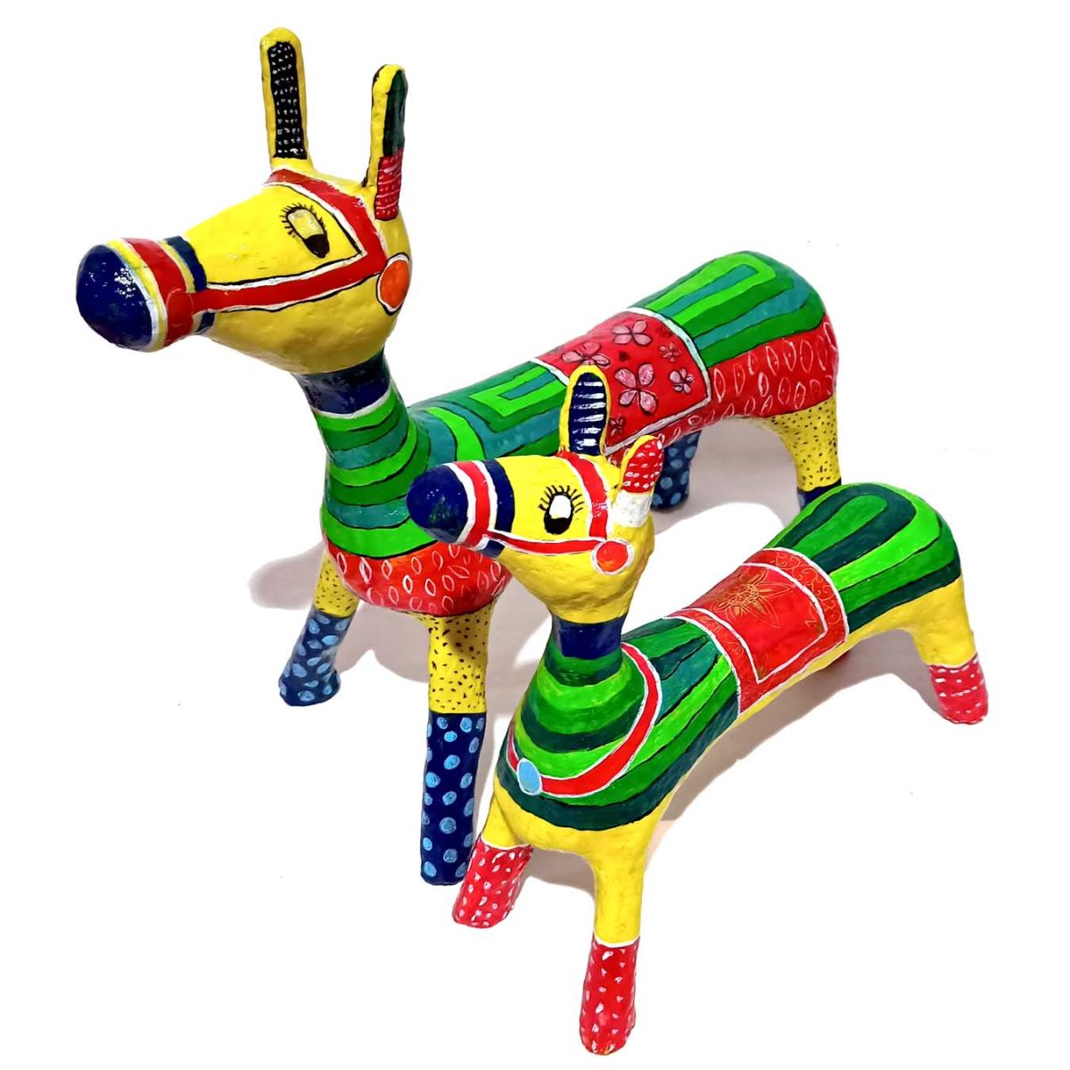Toys prepared from paper pulp.