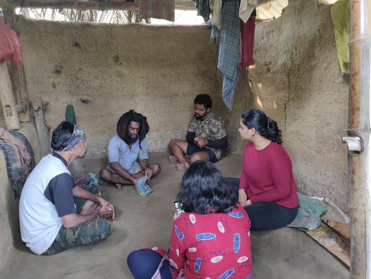 Team members visit a hamlet as part of the Vana Belaku program
