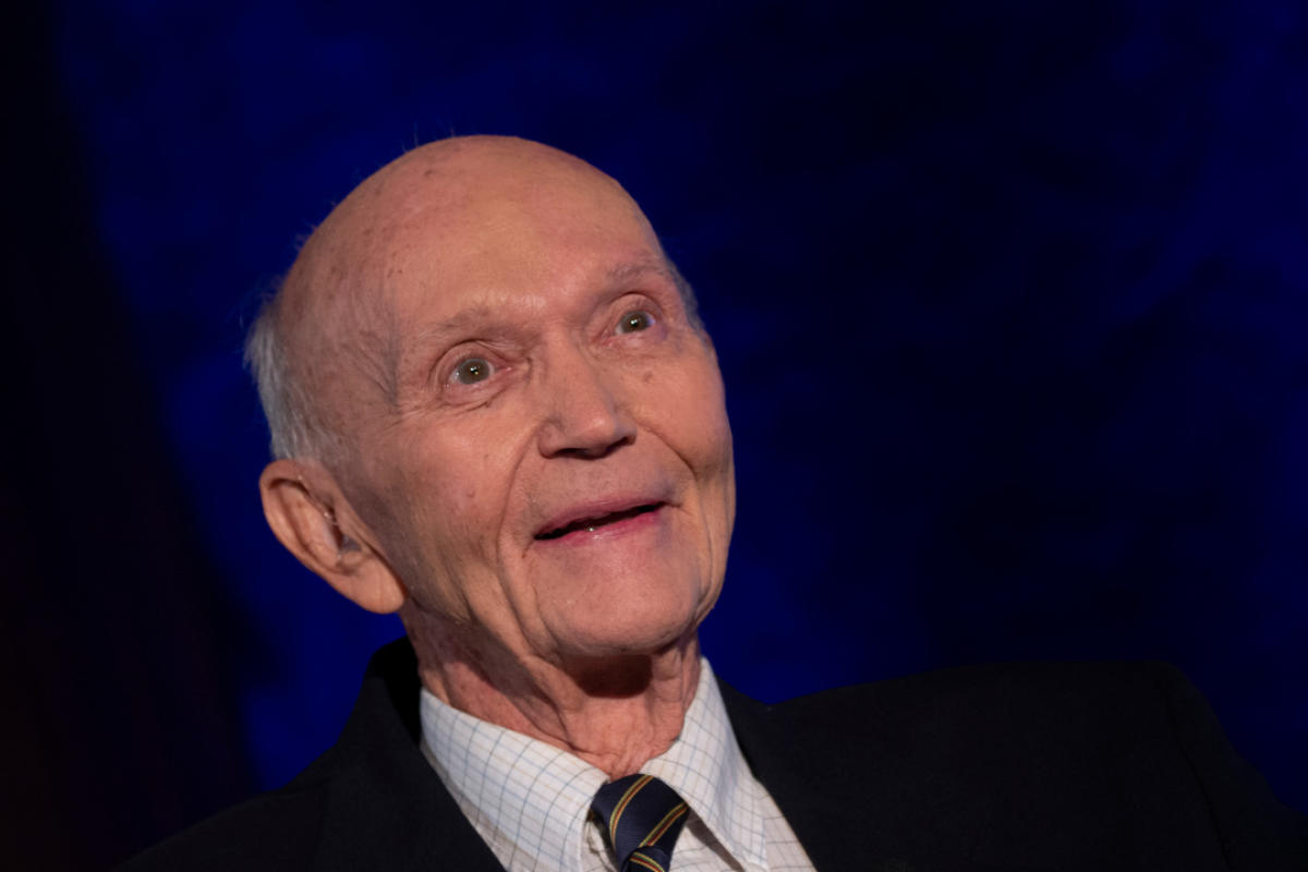 Michael Collins interacts at an event in 2019. Photos by NASA, AFP via Getty Images