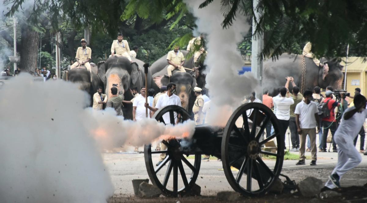 Officials conduct the second round of cannon firing drill on the premises of Mysuru Palace on Tuesday. DH Photo