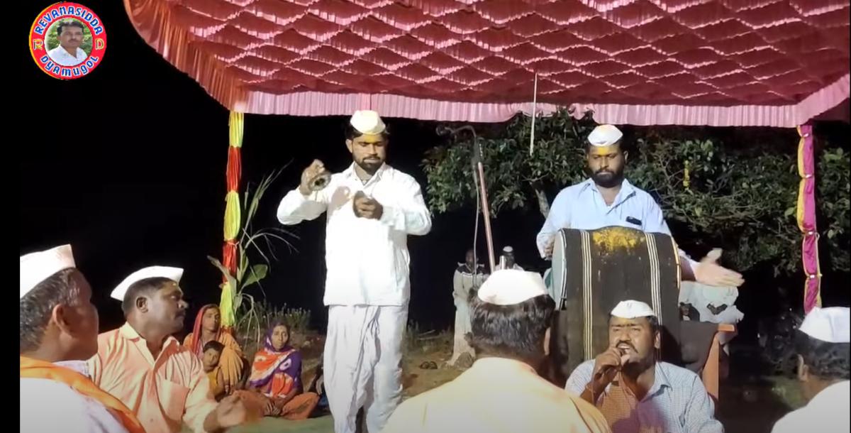 Screengrab from Revanasidda Dyamugol’s YouTube channel, featuring a Dollina Pada performance; Sumitra Mugalihal.