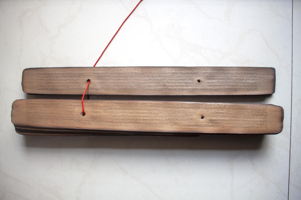 The palm leaf manuscripts are in the Nandinagari script, an ancient dialect of Kannada and Sanskrit; (top) The folios in the possession of Seetharam Javagal were actually astronomical documents.