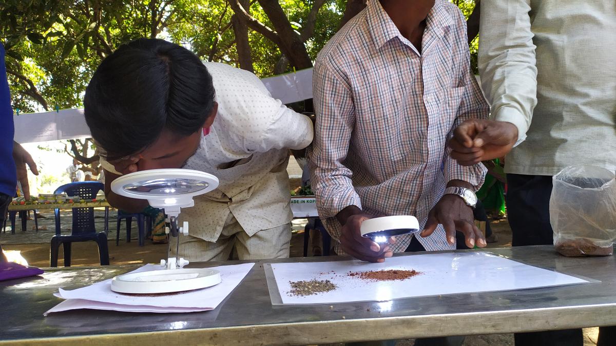 Farmer analysing soil samples. Photo courtesy: Anandteertha Pyati 
