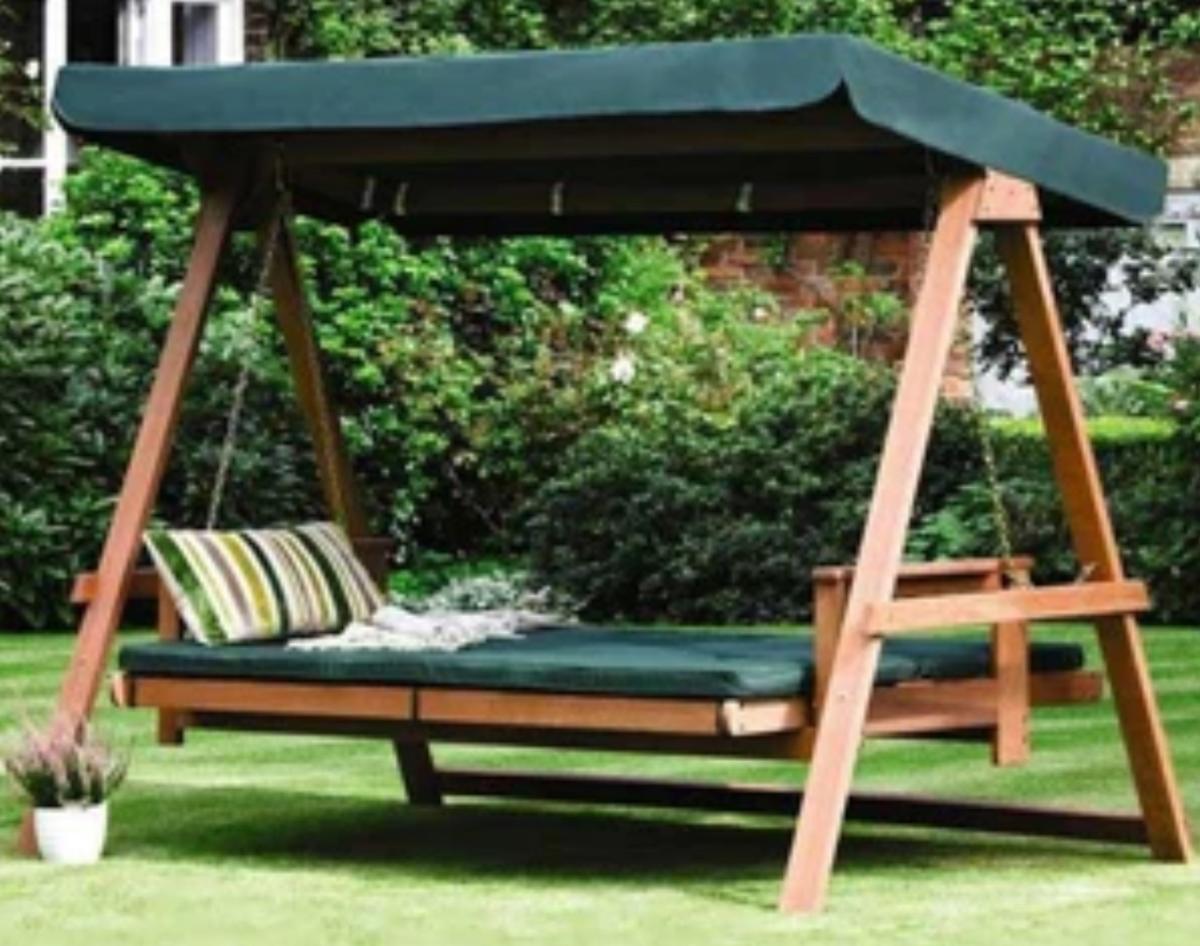Wooden swing. Price:Rs 1.28 lakh at luxox.shop