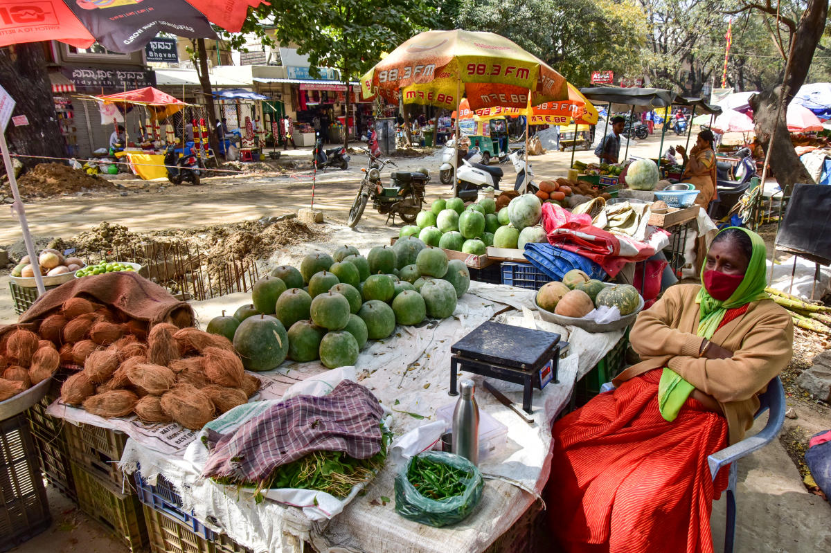 Roads in Gandhi Bazaar, Basavanagudi, are dug up. Work on a hawkers’ zone is in progress nearby. DH Photo/Prashanth H G