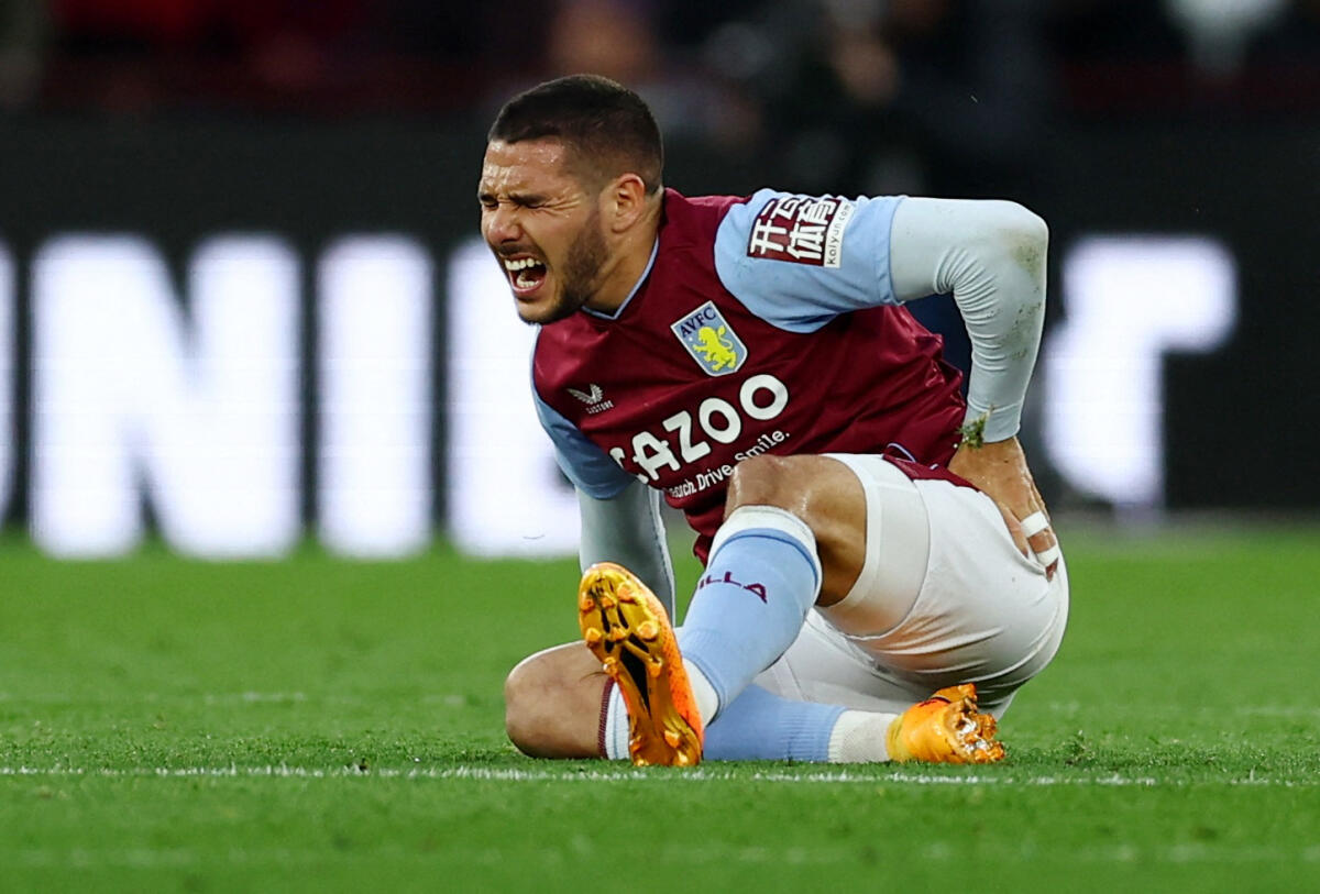Aston Villa's Emiliano Buendia reacts after sustaining an injury. Credit: Reuters Photo