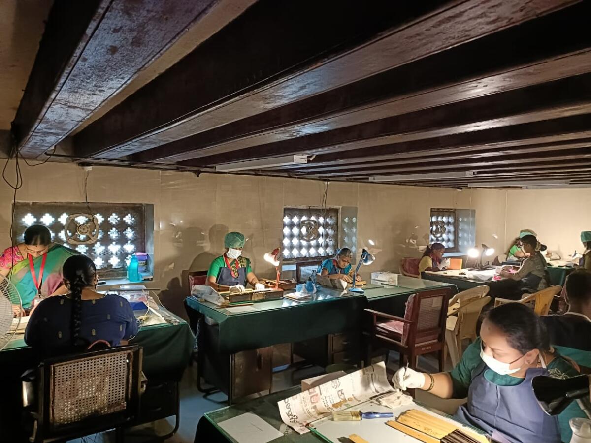 The team working on preserving manuscripts at the Oriental Research Institute, Mysuru. Photos by Rohit Eswar