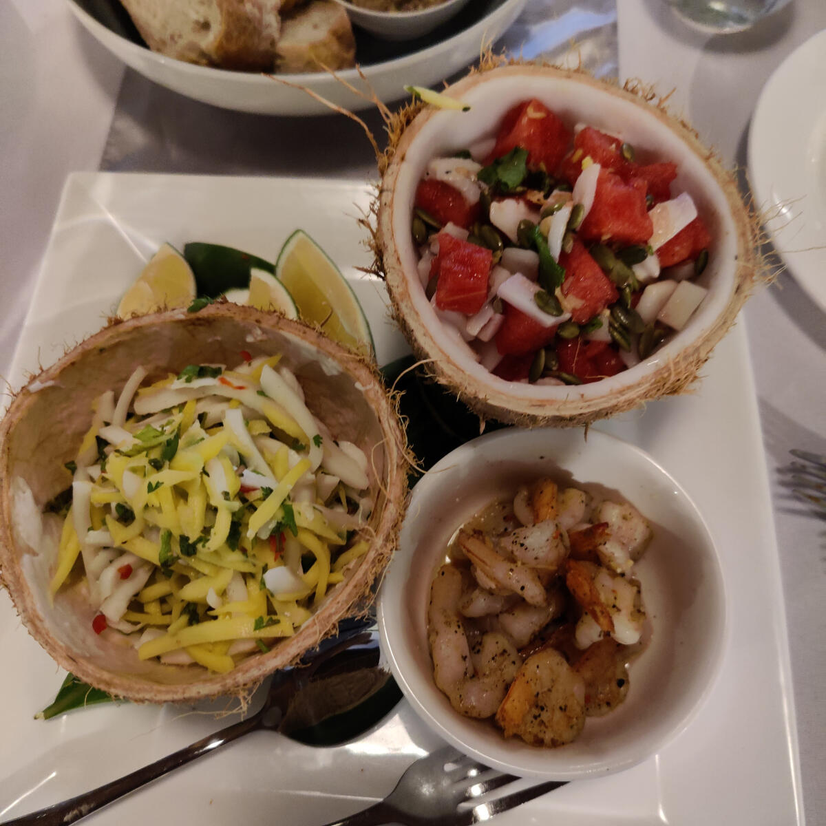  An array of salads servedin coconut shells