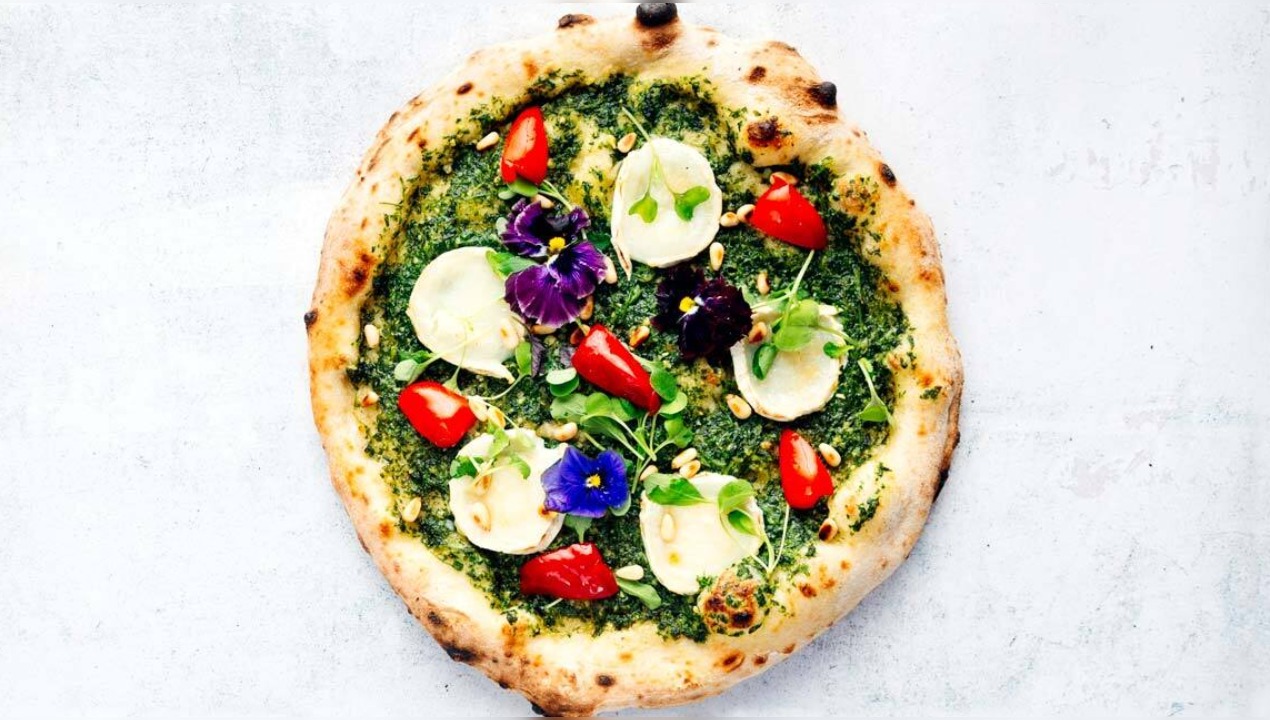 Green pesto and goat cheese pizza. Credit: Karan Raj Aggarwal