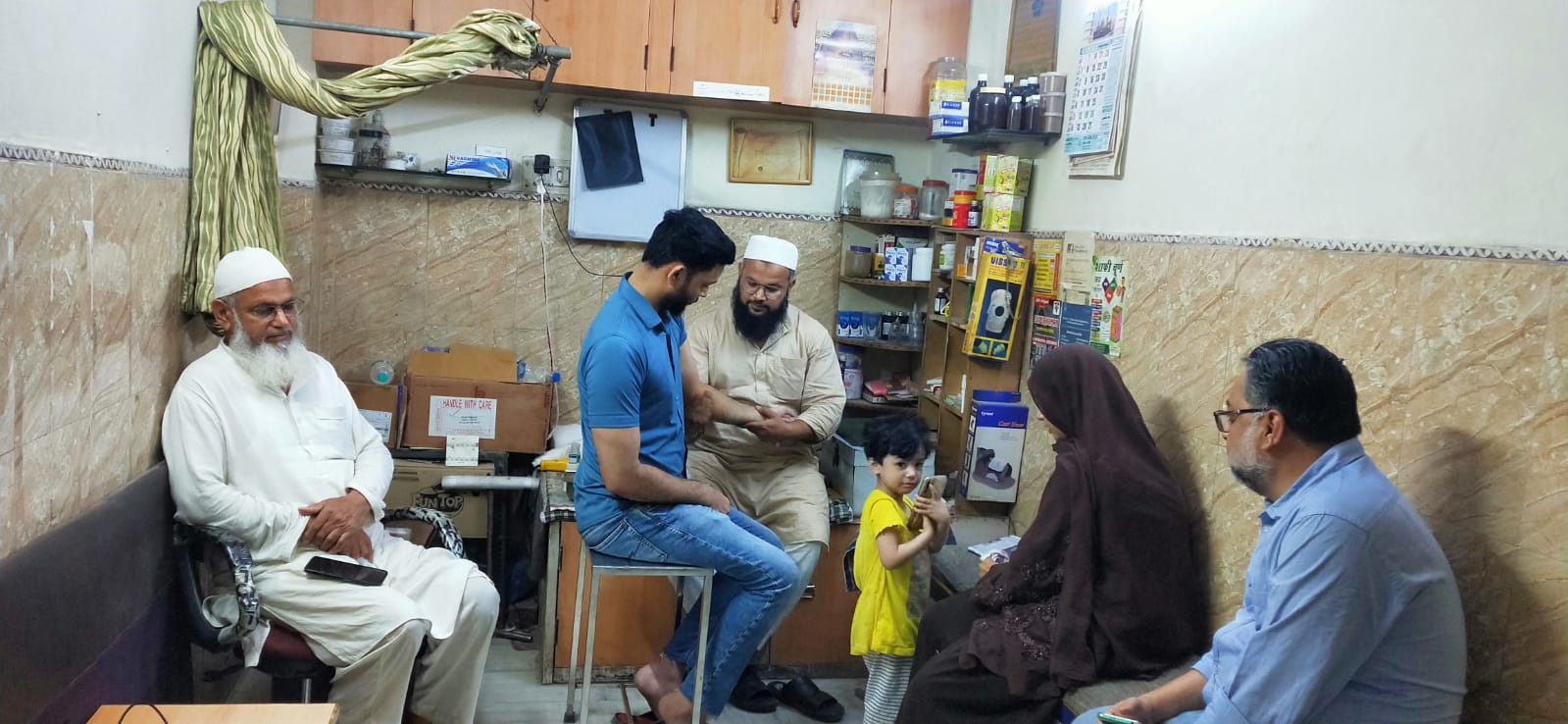 Fareed runs a dawakhand with his son Firoz in Laxmi Nagar, Delhi.