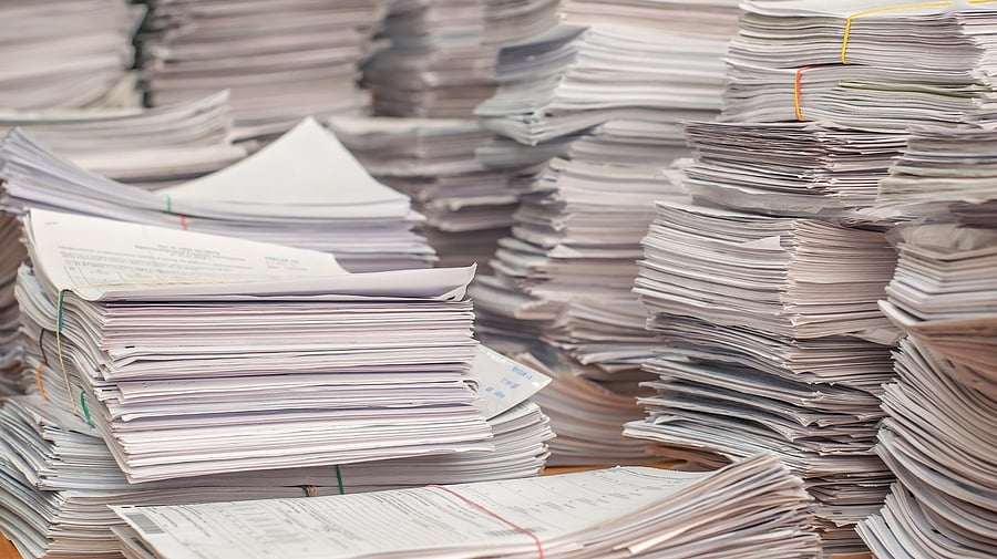 <div class="paragraphs"><p>Representative image of stacks of pages.</p></div>