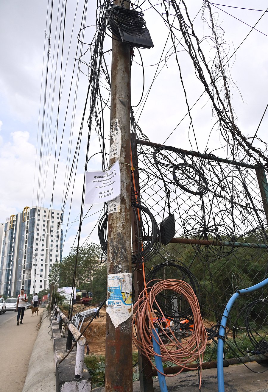 <div class="paragraphs"><p>A tangle of cables hanging haphazardly on an electric pole in Yeshwanthpur. </p></div>
