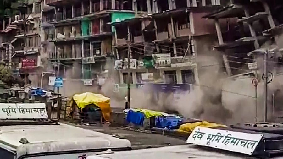 <div class="paragraphs"><p> Buildings collapse due to a rain-triggered landslide at Anni town, in Kullu district, Thursday, Aug 24, 2023. </p></div>