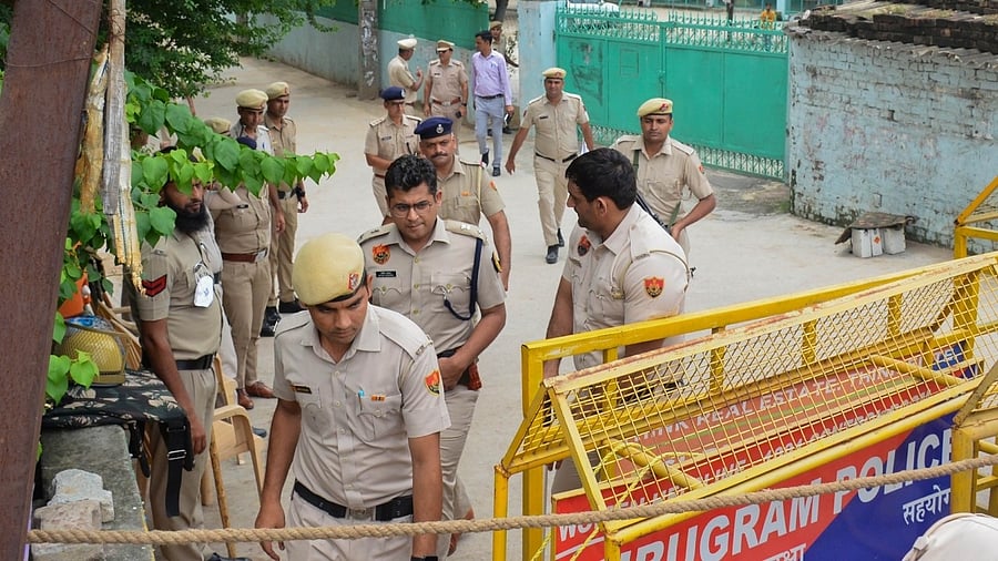 <div class="paragraphs"><p> Police personnel in Gurugram.</p></div>
